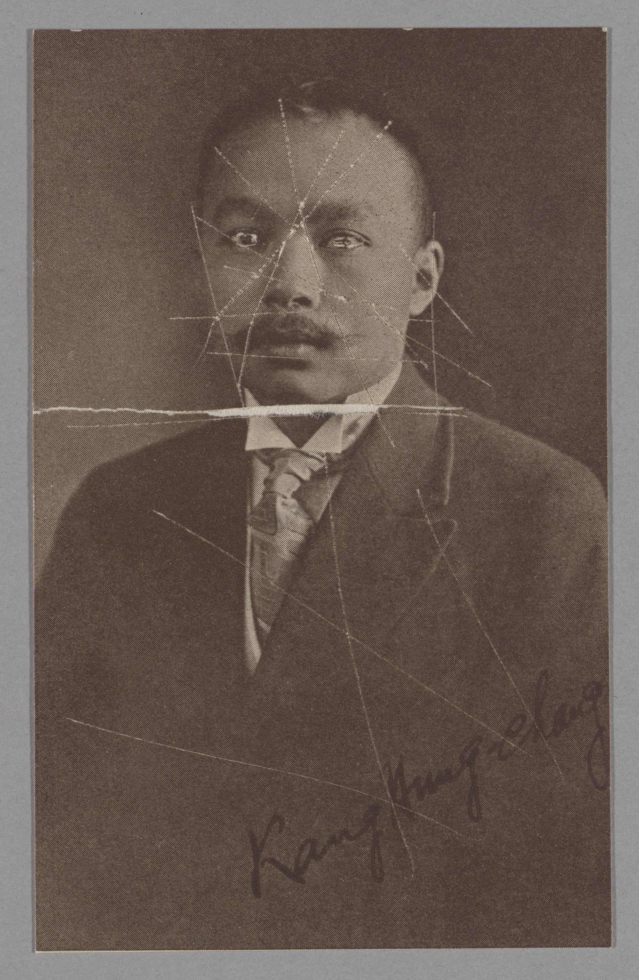 Portrait of Kang Hung-chang (康洪章). The surviving print shows visible damage and creases, preserved as received by the archive.